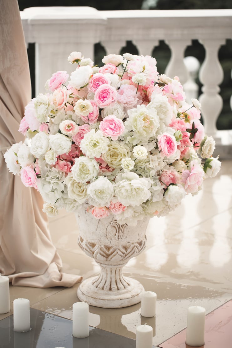 Details. Wedding Ceremony in the Open Air of Fresh Flowers, with Candles. Gentle and Beautiful Wedding Decor for Newlyweds